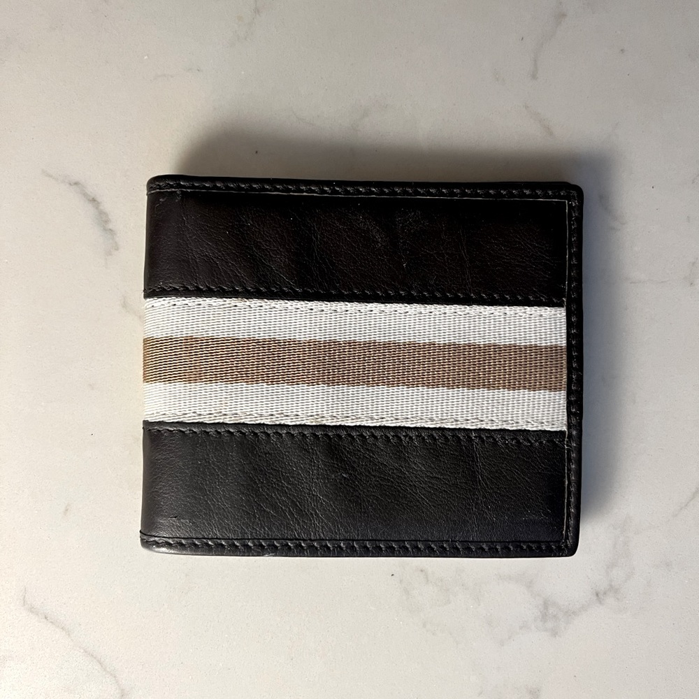 Men’s Gucci leather and canvas wallet
